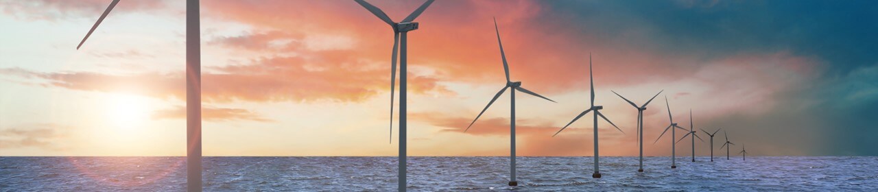 wind turbines at sunset