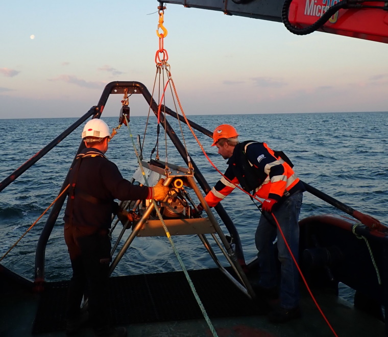 Two people in PPE undertaking a bream nesting survey